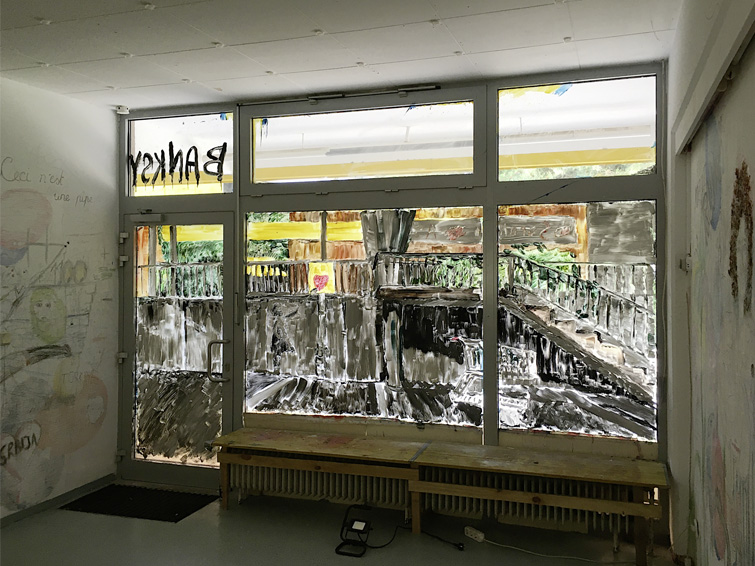 Malerei auf dem Schaufenster des BiB-Lab Grätzl-Labor im Stil von Banksy